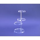 Display mit 4 runde Acrylglas-Scheiben auf einem Eisenstift
